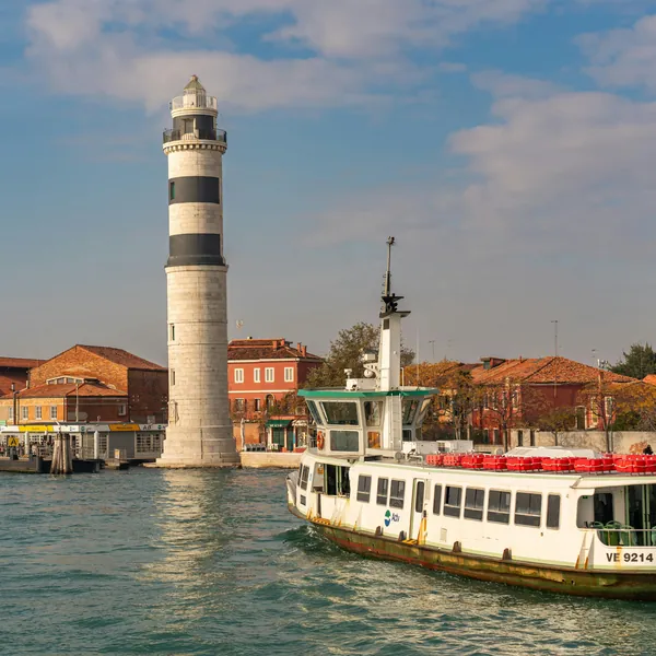 Outer-ring vaporetto near Murano lighthouse